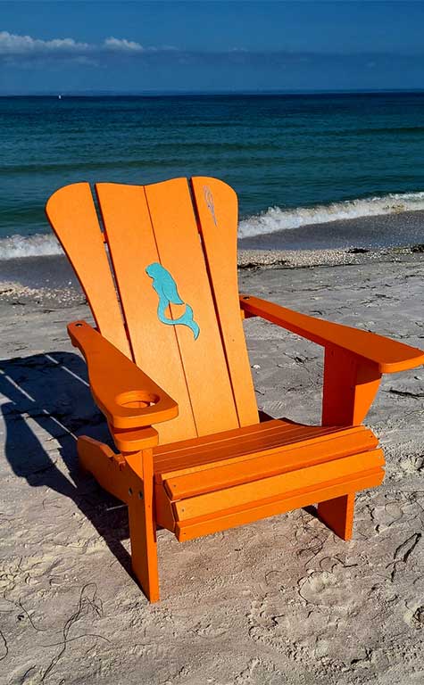 ITOF - Orange chair with mermaid inlay at the back